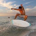 Dynamic Skimboarding at Sunset