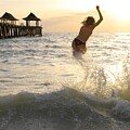 Joyful Leap into Sunset Waves 3400