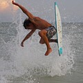 Skimboarder's Dynamic Aerial Maneuver 3449
